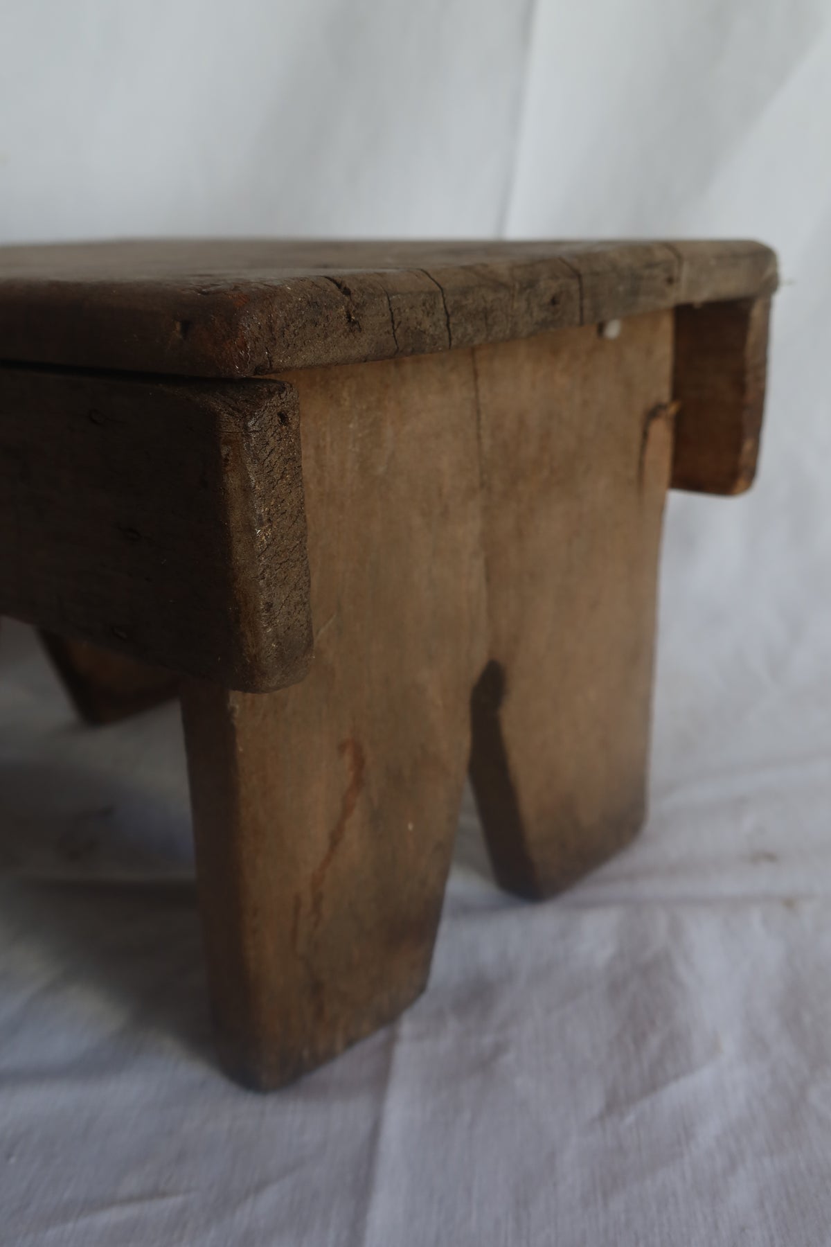 Old wooden primitive stool