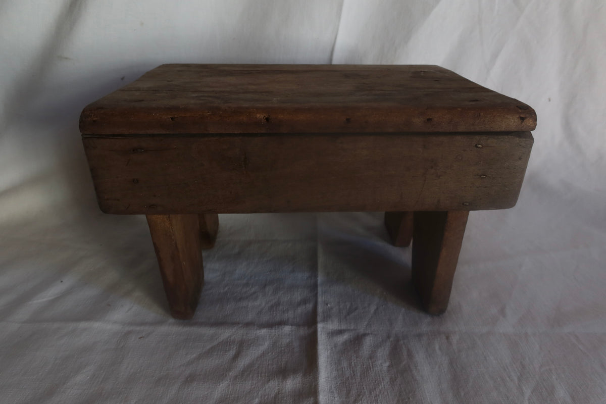 Old wooden primitive stool